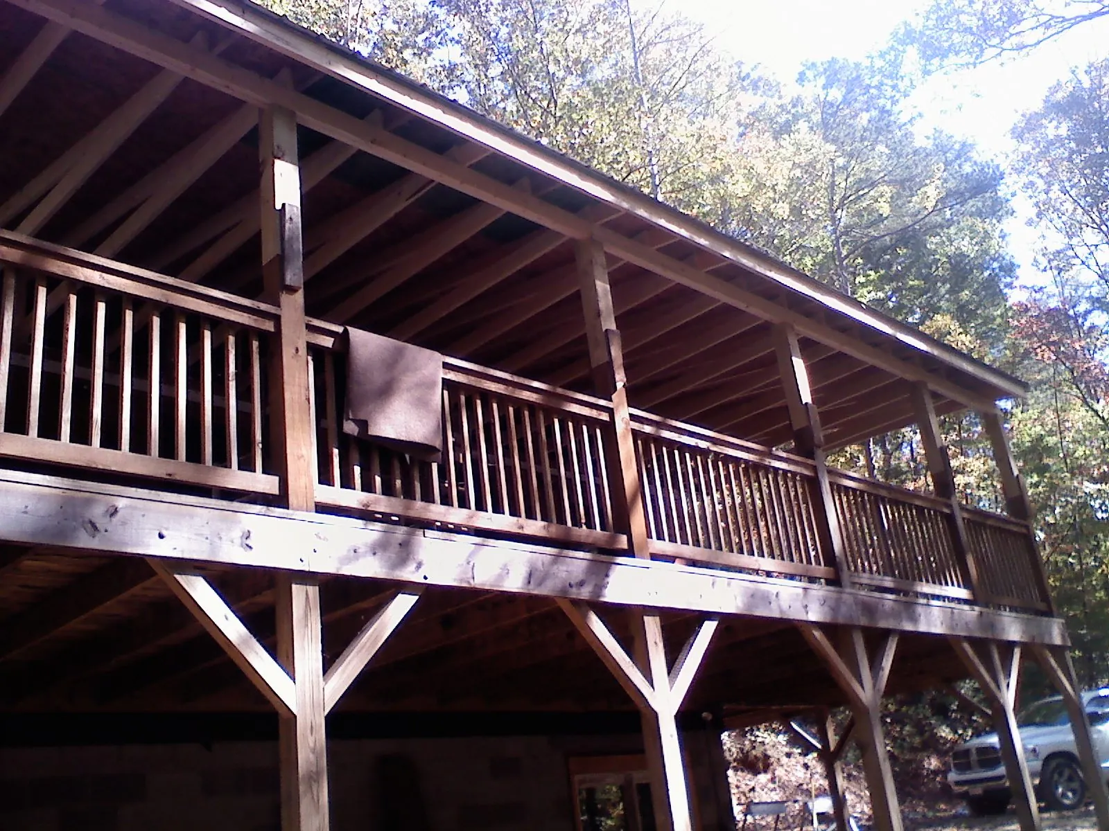 Timber framing under a new elevated porch and deck — Roof Leak Repair in Point Roberts by Roofing Brothers